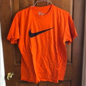 Orange Nike short sleeve shirt
